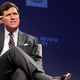 Fox News host Tucker Carlson discusses "Populism and the Right" at the National Review Institute's Ideas Summit in Washington, D.C., in March 2019.